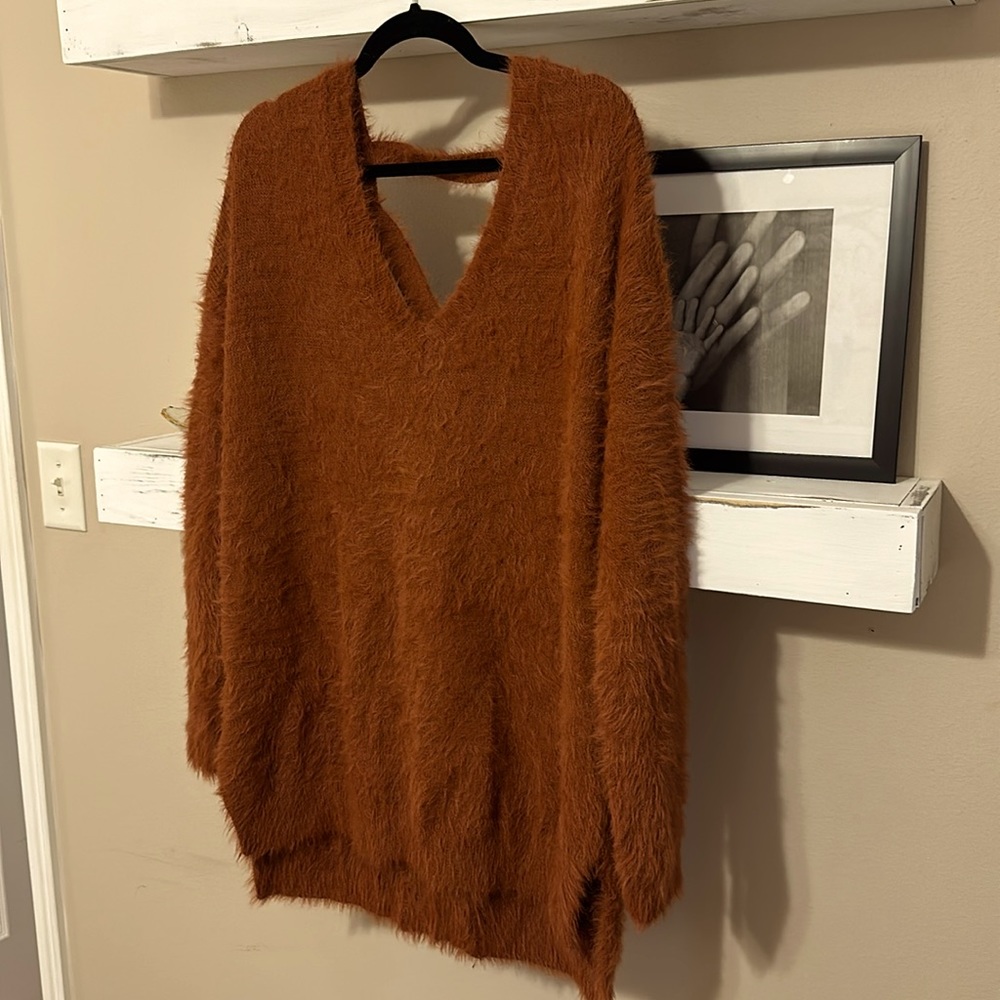 Sweater dress. Rust colored. Could be worn as a dress or with leggings.